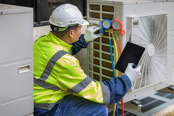 Professional Hvac technician working in Delong, IN
